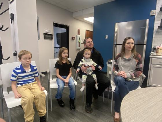 From the left, Owen, Gwyneth and Theodore Poudrier are shown with their parents, Jason and Chelsey Poudrier, during a Jan. 31 interview at the Oklahoma Blood Institute in Lawton. The Poudriers shared Theodore’s story to encourage people to donate blood. ERIC SWANSON | SOUTHWEST CHRONICLE