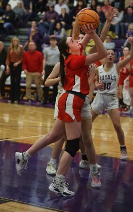 Elgin freshman Kaydence Kern attempts a shot against Community Christian during a Class 4A district title game Friday night. Kern was playing in her first game this season after suffering an injury. (Photo by Hugh Scott Jr.)