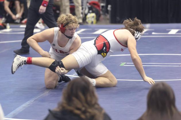 Elgin’s Colyn Donnelly, left, dominates his Collinsville opponent during the semifinal round of the Dual State Championships at Enid. Donnelly won by fall at 1:24 of the second period. HUGH SCOTT JR. | SOUTHWEST CHRONICLE