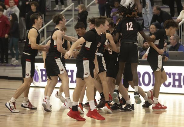 Elgin players react with enthusiasm as they celebrate their regional tournament championship win that sent the team to the Area Tournament this week.  HUGH SCOTT JR. | SOUTHWEST CHRONICLE