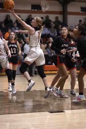 Senior Emma Nunley (2) scores on a layup against Apache earlier this month. She finished the game with 19 points. HUGH SCOTT JR. | SOUTHWEST CHRONICLE