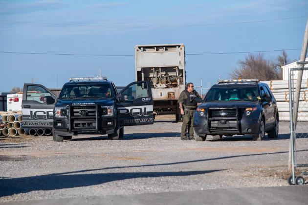 Fletcher police guard a semi trailer removed Jan. 11 from a Multiple Community Services Authority Transfer Station during the search for Athena Brownfield. STEVE BOOKER | SOUTHWEST CHRONICLE