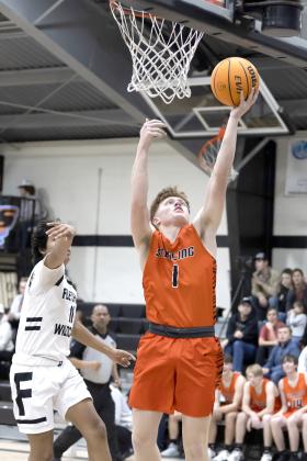 Sterling senior Hayden Taliaferro scores two of his game-high 22 points Tuesday night against Fletcher. The 54-25 win improved Sterling’s record to 7-6 heading into this week’s Black Diamond Tournament at Rush Springs. HUGH SCOTT JR. | SOUTHWEST CHRONICLE