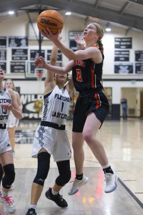 Senior Emma Nunley scores on a layup during a game against Fletcher recently. The Lady Tigers captured the Comanche County Tournament with a 47-30 win over Walters in the championship matchup. Nunley led Sterling in scoring in each game. HUGH SCOTT JR. | SOUTHWEST CHRONICLE