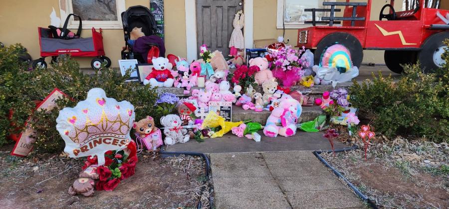Area residents placed stuffed animals and flowers at a memorial for 4-year-old Athena Brownfield at the house at 225 W. Nebraska in Cyril, where she lived with her sister. STEVE BOOKER | SOUTHWEST CHRONICLE