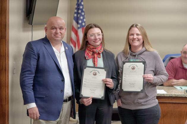 From the left, Elgin Mayor JJ Francais presents Elgin Middle School eighth-grader Josie Chandler, and Elgin Middle School Teacher Jessica Smith with mayoral citations during a Feb. 16 Elgin City Council meeting. CHRISTOPHER BRYAN
