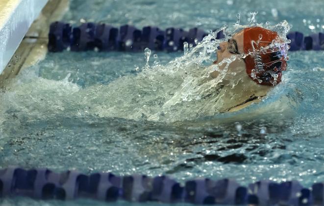 Elgin junior Ellie Stevenson competes in the 200-yard individual medley during the Class 5A state swim meet last week at Mitch Park YMCA. HUGH SCOTT JR. | SOUTHWEST CHRONICLE