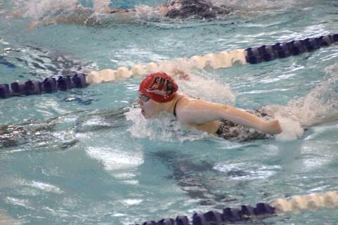 Elgin junior Ellie Stevenson swims in one of four events at the regional meet last week Stevenson qualified for the state meet in four events. The state meet begins Friday and continues Saturday at Mitch Park YMCA. PHOTO PROVIDED