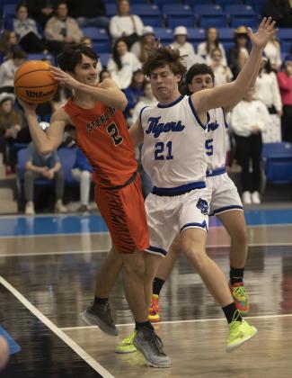Tiger Max Puccio saves the ball from going out of bounds during regional action against Union City.  HUGH SCOTT JR. | SOUTHWEST CHRONICLE