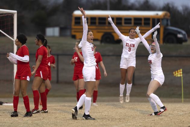Elgin players Emma Rhinhart, Joanie Kenny and Mikaela Scholl celebrate a second half goal against McLoud Tuesday night. Elgin’s 6-1 win improved its record to 2-1. HUGH SCOTT JR. | SOUTHWEST CHRONICLE