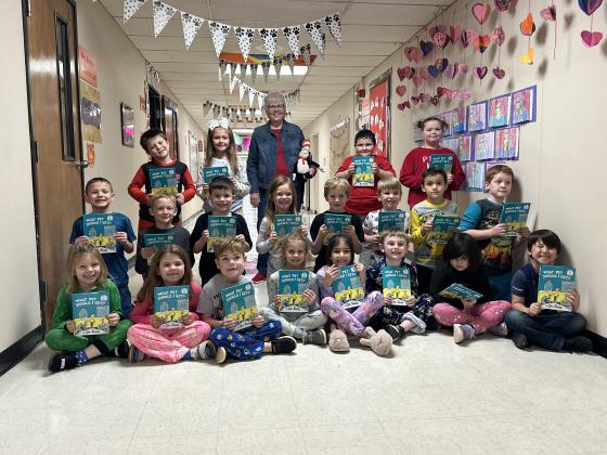 To help celebrate Read Across America Day, Friends of Elgin Community Library member Jeanne Cook reads the Dr. Seuss classic Green Eggs and Ham to Mrs. Ashlyn McCall’s first grade class in Sterling. Students read along and picked out rhyming words. CURTIS AWBREY | SOUTHWEST CHRONICLE