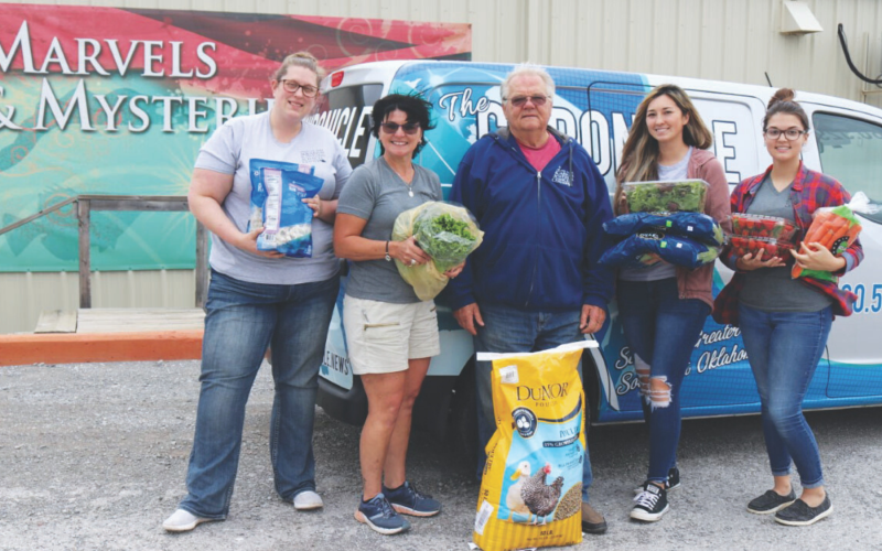 In addition to the produce, Hilliary Communications donated an extra $2,000. The monetary donation is expected to cover animal food costs at the aquarium for one month. On Monday, April 6, Medicine Park Aquarium &amp; Natural Sciences Cen- ter staff, Nicole Rowe, Rainette Rowland, Doug Kemper, Nicole Hill and Jacey Smith scooped up armfuls of donated produce and feed, ready to deliver it to the variety of animal species housed at the aquarium.