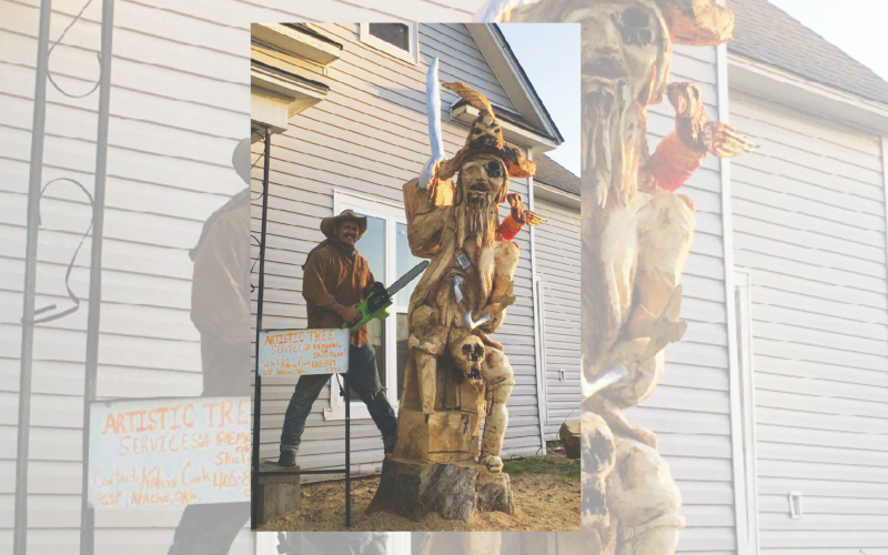 Kalvin Cook is shown recently on Idaho Ave. in Cyril with his chainsaw tree sculpture. He is a trick roper, but COVID-19 has put most entertainment venues on hold. The Cyril pirate is Kal's tenth commissioned chainsaw sculpture to date.