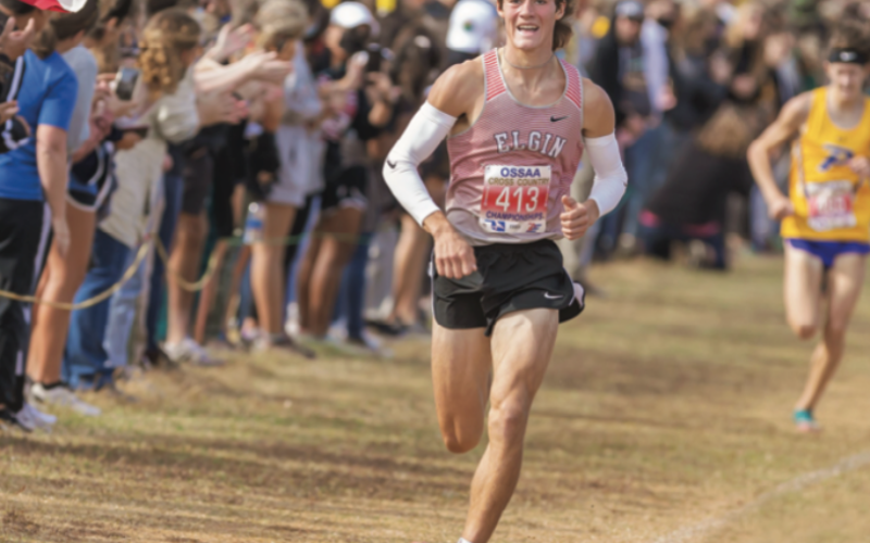 Gage McElhaney wins Cross Country Gold