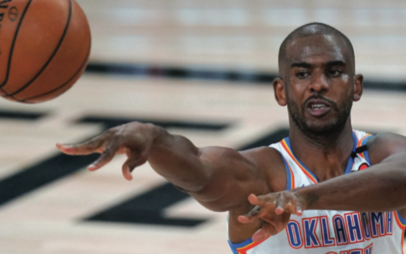 Oklahoma City Thunder’s Chris Paul makes a pass during the first half of an NBA first-round playoff basketball game against the Houston Rockets in Lake Buena Vista, Fla., in this Wednesday, Sept. 2, 2020.