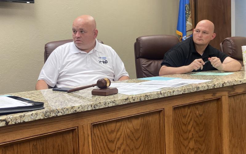 : From the left, Elgin Mayor JJ Francais and Elgin City Councilman Joshua Thoma listen to a discussion April 1 at Elgin City Hall. The council has scheduled a June 28 election to fill the vacant Ward 2 seat on the council. Eric Swanson/Staff photo