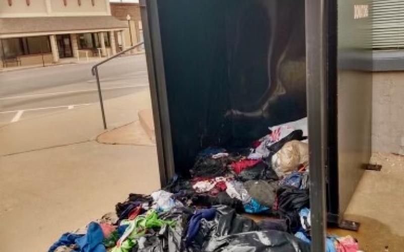 Fletcher police said a group of unidentified suspects set fire to a clothing donation box on Cole Avenue Sunday. The box serves as a collection point for donations to Arena Cowboy Church’s clothing closet.