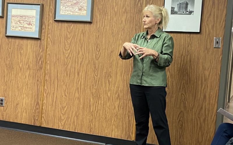 Nancy Graham, air quality manager for the Indian Nation Council of Governments, addresses the Comanche County Board of Commissioners on Monday at the Comanche County Courthouse. The board voted to join Oklahoma’s Commercial Property Assessed Clean Energy Program and asked INCOG to administer the program on the county’s behalf.  Eric Swanson/Staff photo