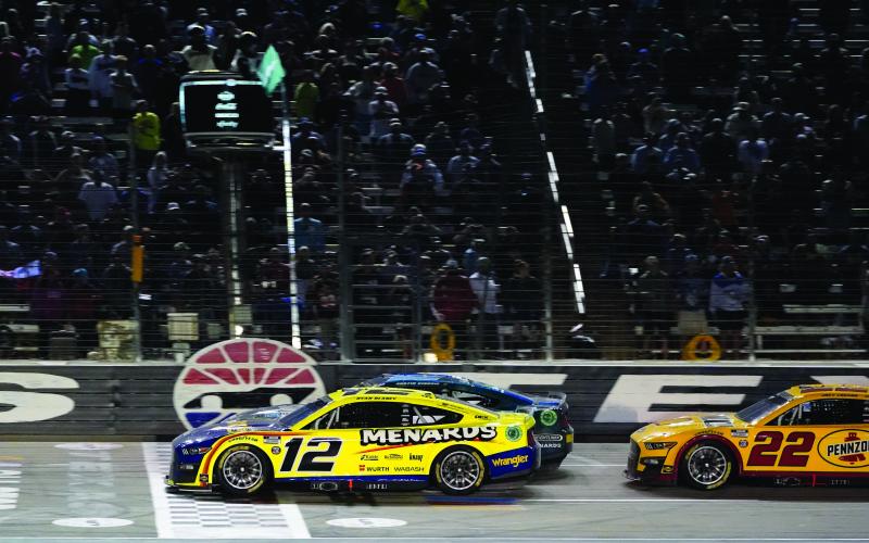 Ryan Blaney (12), Austin Cindric (2) and Joey Logano (22) take the green flag for the final restart of the NASCAR All-Star auto race at Texas Motor Speedway in Fort Worth, Texas, Sunday, May 22, 2022.  (AP Photo/Larry Papke)