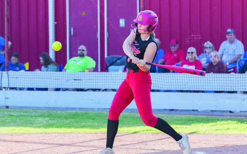 Photo by Rick Endicott SWINGING AWAY: Hanna Endicott takes a cut during the game against Cache on Friday, April 11.
