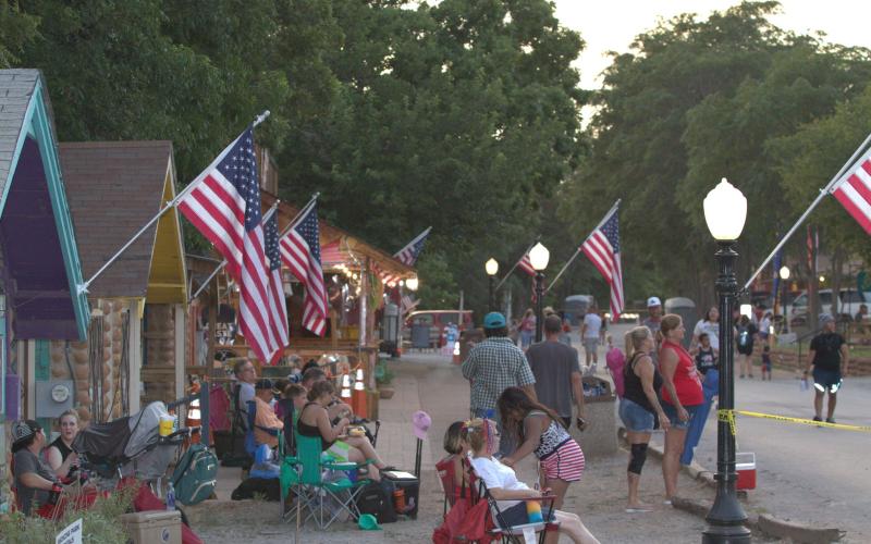 Attendees listen to music during a previous Rock The Park festival and Fourth of July Celebration in Medicine Park. Jeremy Robbins/File Photo