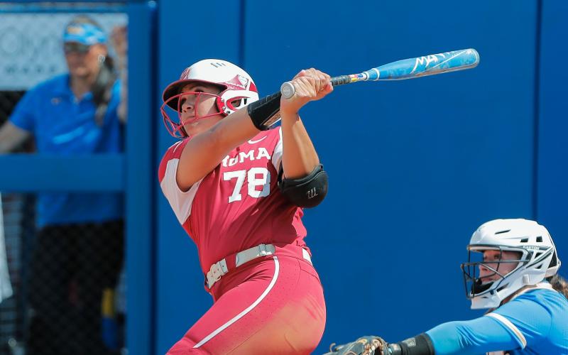 Oklahoma's Jocelyn Alo (78) hits a grand slam during fifth inning of an NCAA softball Women’s College World Series elimination game against UCLA on Monday, June 6, 2022, in Oklahoma City.  (AP Photo/Alonzo Adams)