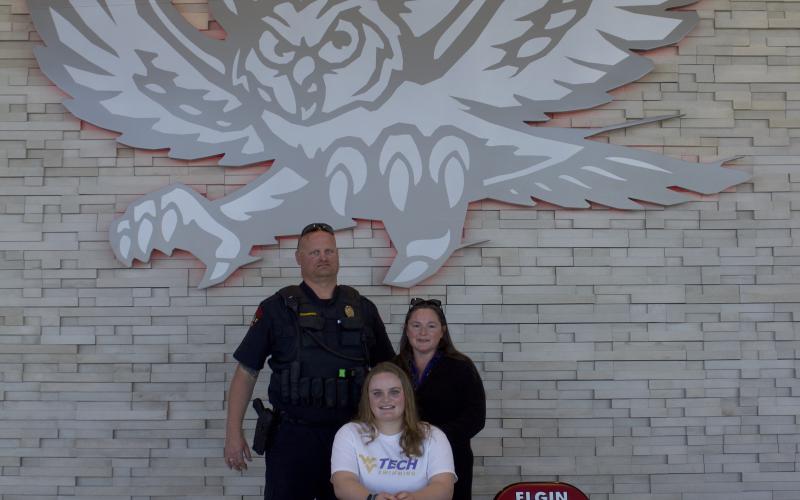 Vivian Vanderpool signs with West Virginia Tech in early spring 2022.  Proud parents James and Jaclyn Vanderpool watch as their daughter chooses to follow her grandfather’s legacy and earn a degree in chemical engineering. As a Golden Bear, Vanderpool will compete in NAIA Appalachian Conference. She is the first swimmer from Elgin High School to sign with a university to swim competitively, a March 24 post on Elgin Public Schools Athletics Facebook page states. Photo by Denisse Findlay
