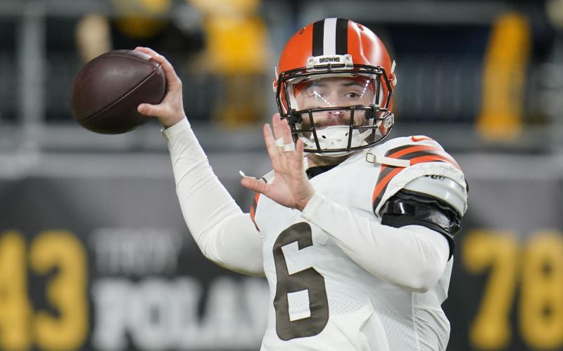 FILE - Cleveland Browns quarterback Baker Mayfield (6) warms up before an NFL football game against the Pittsburgh Steelers, on Jan. 3, 2022, in Pittsburgh. Mayfield’s rocky run with Cleveland officially ended Wednesday, July 6, 2022, with the Browns trading the divisive quarterback and former No. 1 overall draft pick to the Carolina Panthers, a person familiar with the deal told The Associated Press. (AP Photo/Gene J. Puskar, File)