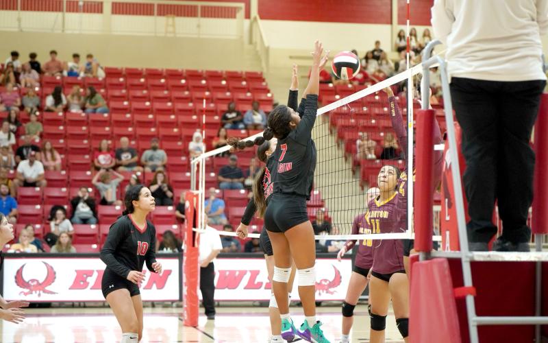 Amaya Rodriguez, right, tallies one of her 13 kills during Tuesday’s match at Clinton. Elgin won each set by scores of 25-17, 25-15 and 25-11. Photo by Rebecca Harvey