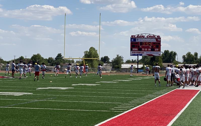 Elgin Owls football players endure the heat during a mid-August practice ahead of the 2022 season. Photos by Curtis Awbrey