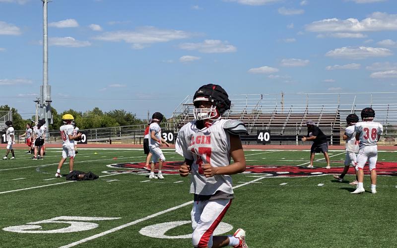Elgin Owls football players put in work Friday, Aug. 12 as they look to compete with other 5A schools. PHOTO BY CURTIS AWBREY