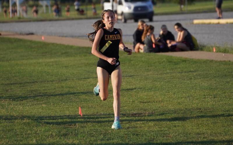 Cameron University’s Bella Vignes runs in last Saturday’s Aggie Duels in Lawton. Vignes won the individual title. Photo by Cameron Sports Information.