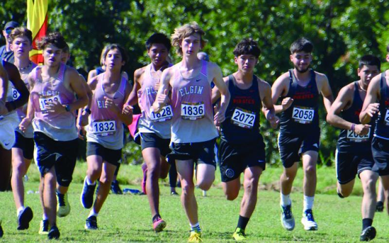 From left, Elgin cross country runners Jake Jones, Jordan Pierce, Tristan Nunez, Alan Lares, and Ben Roberts compete in the Carl Albert Invitational on Friday, Sept. 2. Photo courtesy of Jon Hughes.