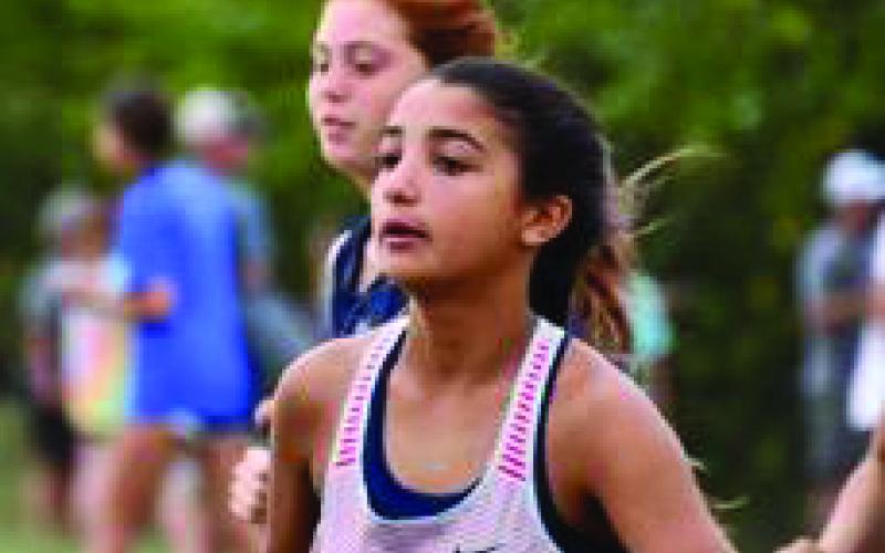   Elgin's Annelis Perez competes at a recent cross country meet. Perez finished 25th at the Newcastle Invitational with a time of 22:04. (Photo by Lisa Roberts)