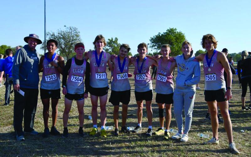 The Elgin boys' cross country team poses for a photograph after winning the team title at the Newcastle Invitational last week. Three runners finished in the top 15. Photo provided by Lisa Roberts