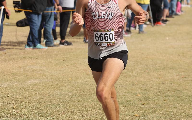 Elgin senior Hunter Monostori heads to the finish line at the 5A West regional meet. Monostori qualified for the state meet where he finished seventh. HUGH SCOTT JR. | SOUTHWEST CHRONICLE