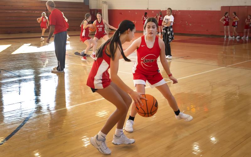Lady Owls go one-on-one during a recent practice. Elgin defeated Altus in the first game of the season, 55-38. PHOTO BY HUGH SCOTT JR.