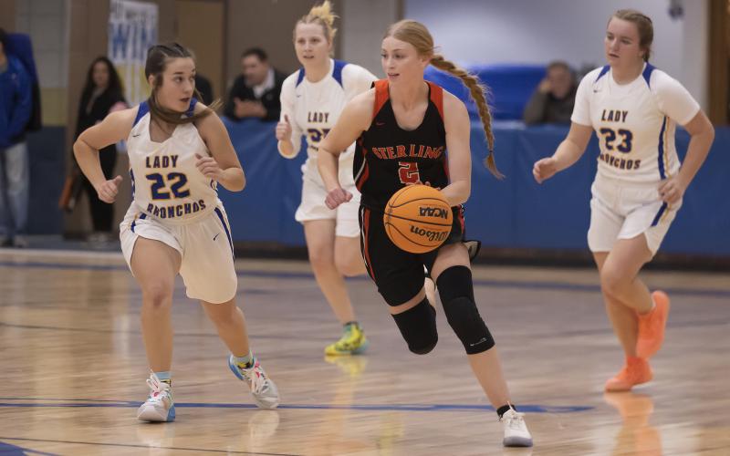 Emma Nunley dribbles toward the basket during a win over Central High. Nunley and the Lady Tigers also won Tuesday’s game against Cement, 71-24, as Nunley finished with 34 points. PHOTO BY HUGH SCOTT JR.