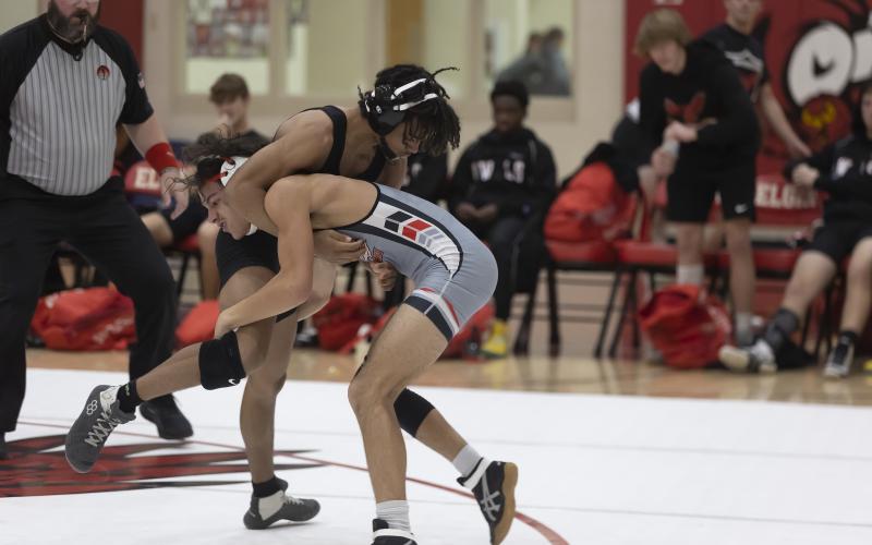 Elgin’s Nino Vivic wrestles his Comanche opponent during the first match of the season. Vivic placed third at last weekend’s Blanchard Tournament and recorded a pin in his match against Weatherford on Tuesday. PHOTO BY HUGH SCOTT JR.