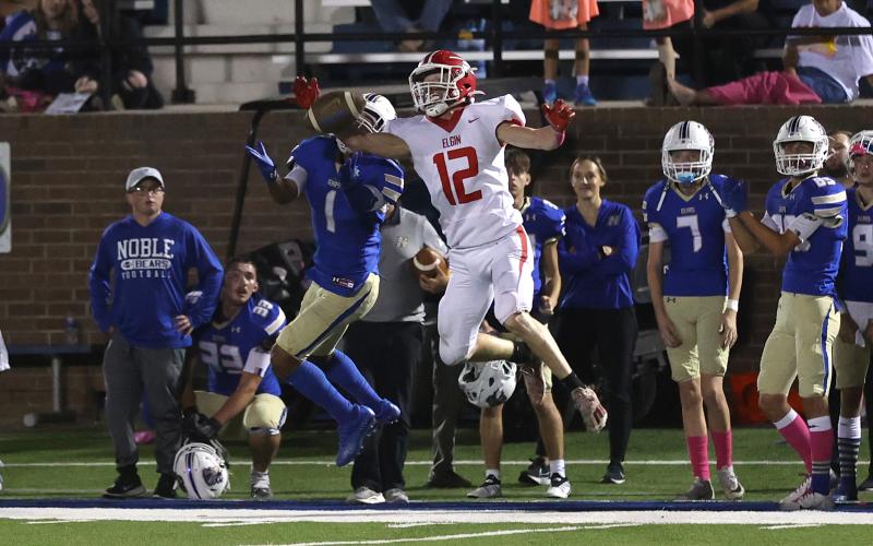 Elgin’s Toby Parker (12) bats the ball away from a Noble receiver during a game this season. Parker was named District 5A-1 Defensive Back of the Year by district coaches. Parker finished the season with four interceptions and more than 60 tackles. PHOTO BY HUGH SCOTT JR.