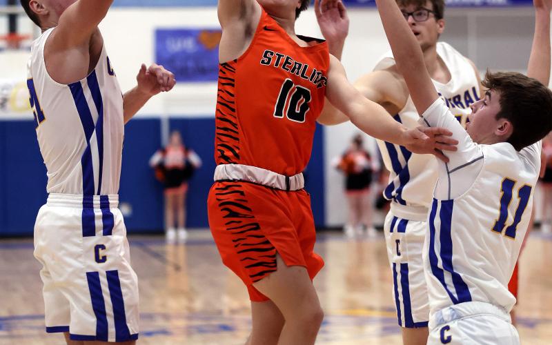 Freshman Tukker Hughes (10) takes a shot against Central High Tuesday night during Sterling's 44-32 loss. Hughes finished with three points. PHOTO BY HUGH SCOTT JR.