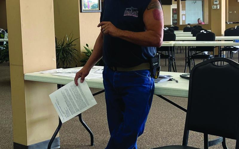 Comanche County Veterans Council Chairman George Keck explains how to sign up for the Oklahoma Veterans Registry during an Aug. 20 meeting at Bingo Country in Lawton. Disabled veterans who are exempt from sales taxes must register with the state by July 1, 2023, to keep the exemption. ERIC SWANSON | SOUTHWEST CHRONICLE