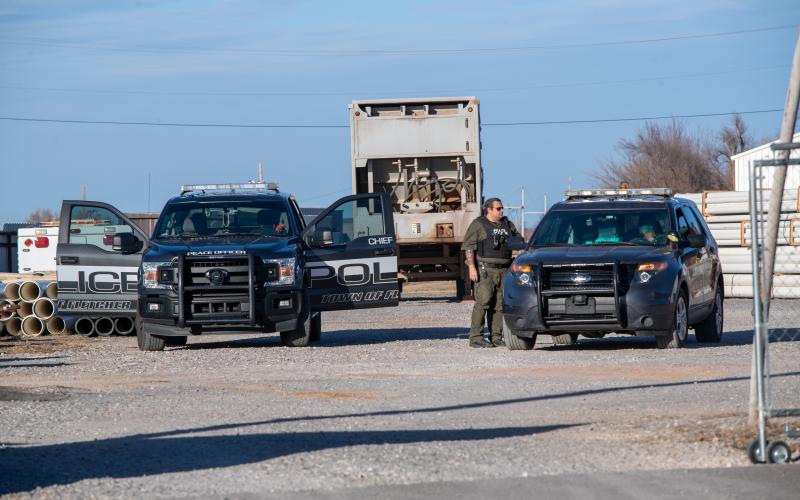 Fletcher police guard a semi trailer removed Jan. 11 from a Multiple Community Services Authority Transfer Station during the search for Athena Brownfield. STEVE BOOKER | SOUTHWEST CHRONICLE