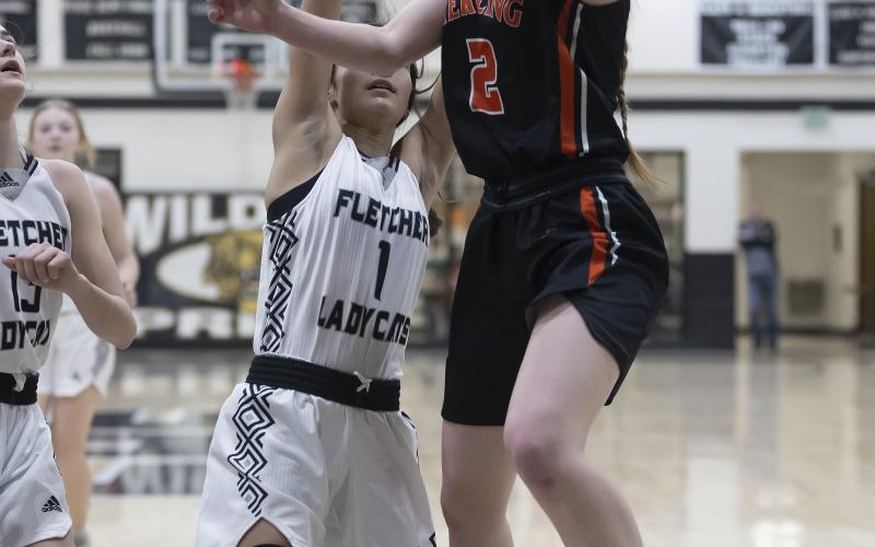 Sterling senior Emma Nunley attempts a layup against Fletcher in a recent game. Nunley scored in double figures in each of the Black Diamond Tournament games held last week. HUGH SCOTT JR. | SOUTHWEST CHRONICLE