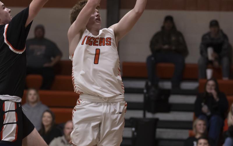 Sterling senior Hayden Taliaferro grabs a rebounds in a game against Apache in December. Taliaferro scored the winning bucket last Friday in a 64-62 win over Alex. HUGH SCOTT JR. | SOUTHWEST CHRONICLE