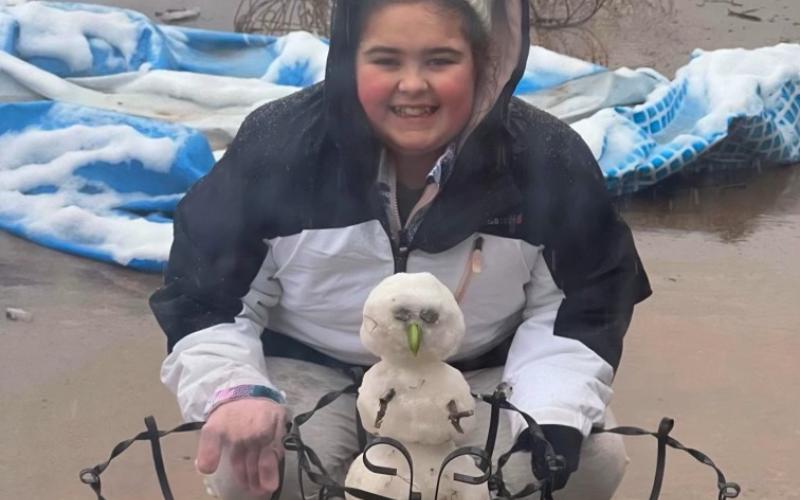 Emily Hall, 12, of Elgin, took the opportunity to create a snow owl during a recent snowfall event. KRISTEN HALL