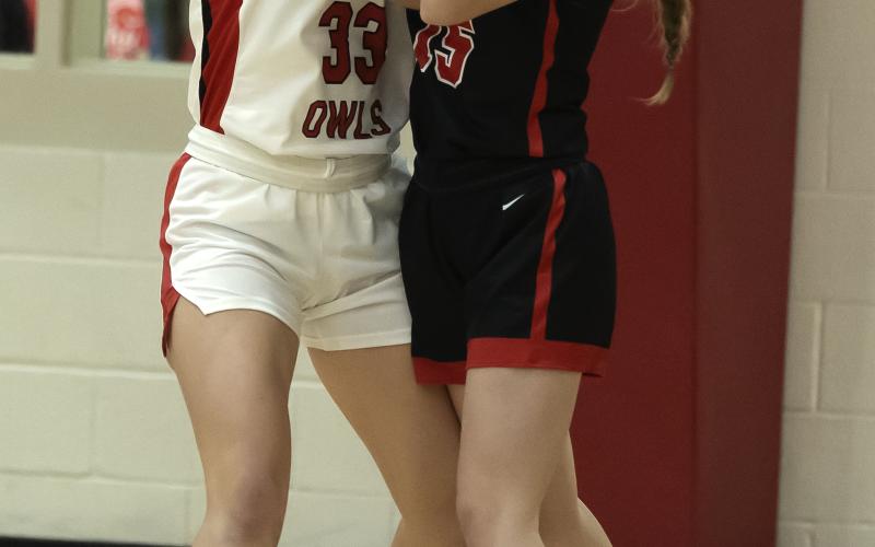 Freshman Kelby Carter grabs the ball from a Duncan opponent during action in mid-December. Carter scored 12 points during Elgin’s 59-21 win over Cache Tuesday night. HUGH SCOTT JR. | SOUTHWEST CHRONICLE