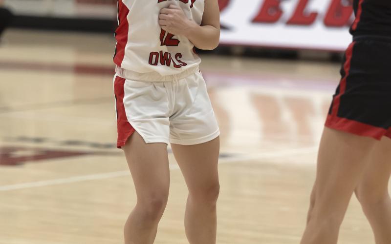 Freshman point guard Maycee Hill (12) passes the ball to a teammate during a recent game. Elgin defeated Cache 51-29 Tuesday night as Hill led all scorers with 18 points. HUGH SCOTT JR. | SOUTHWEST CHRONICLE