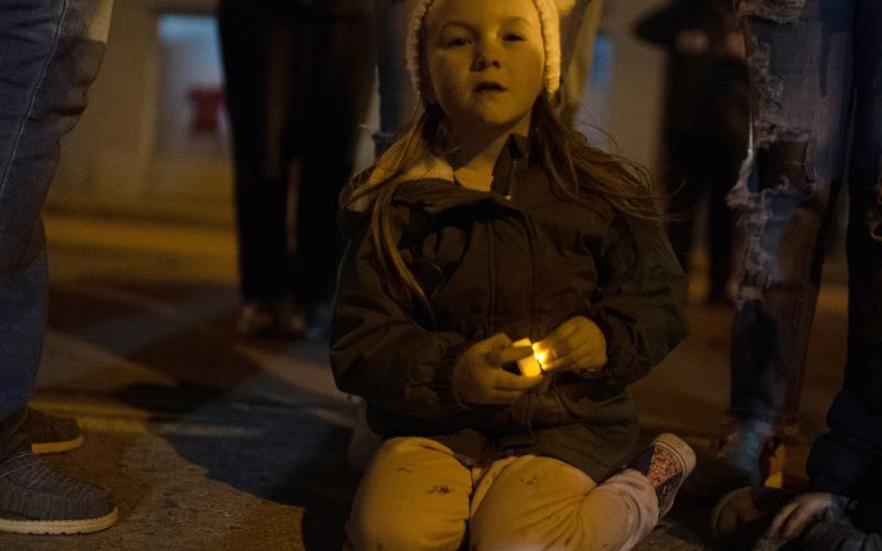 A candlelight vigil was held Saturday in Cyril for 4-year-old Athena Brownfield. Residents gathered at 8 p.m. in front of Cyril City Hall, where Cyril Fire Chief Gerard Dodson gave a formal statement on behalf of the Town of Cyril. Authorities have charged Brownfield’s caretakers with her murder, which they say occurred Dec. 25, 2022. STEVE BOOKER |  SOUTHWEST CHRONICLE