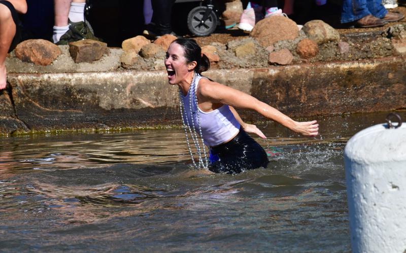 About 200 people braved the not-quite-freezing water of Bath Lake last Saturday to take part in Medicine Park’s annual Polar Plunge. STEVE BOOKER | SOUTHWEST CHRONICLE